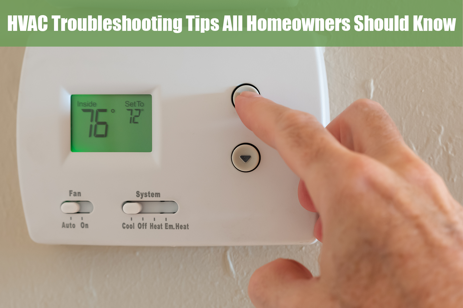 Person adjusting the temperature on their thermostat as an HVAC troubleshooting trick.