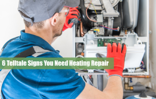 An anonymous HVAC technician, performing heating repairs on a home furnace.