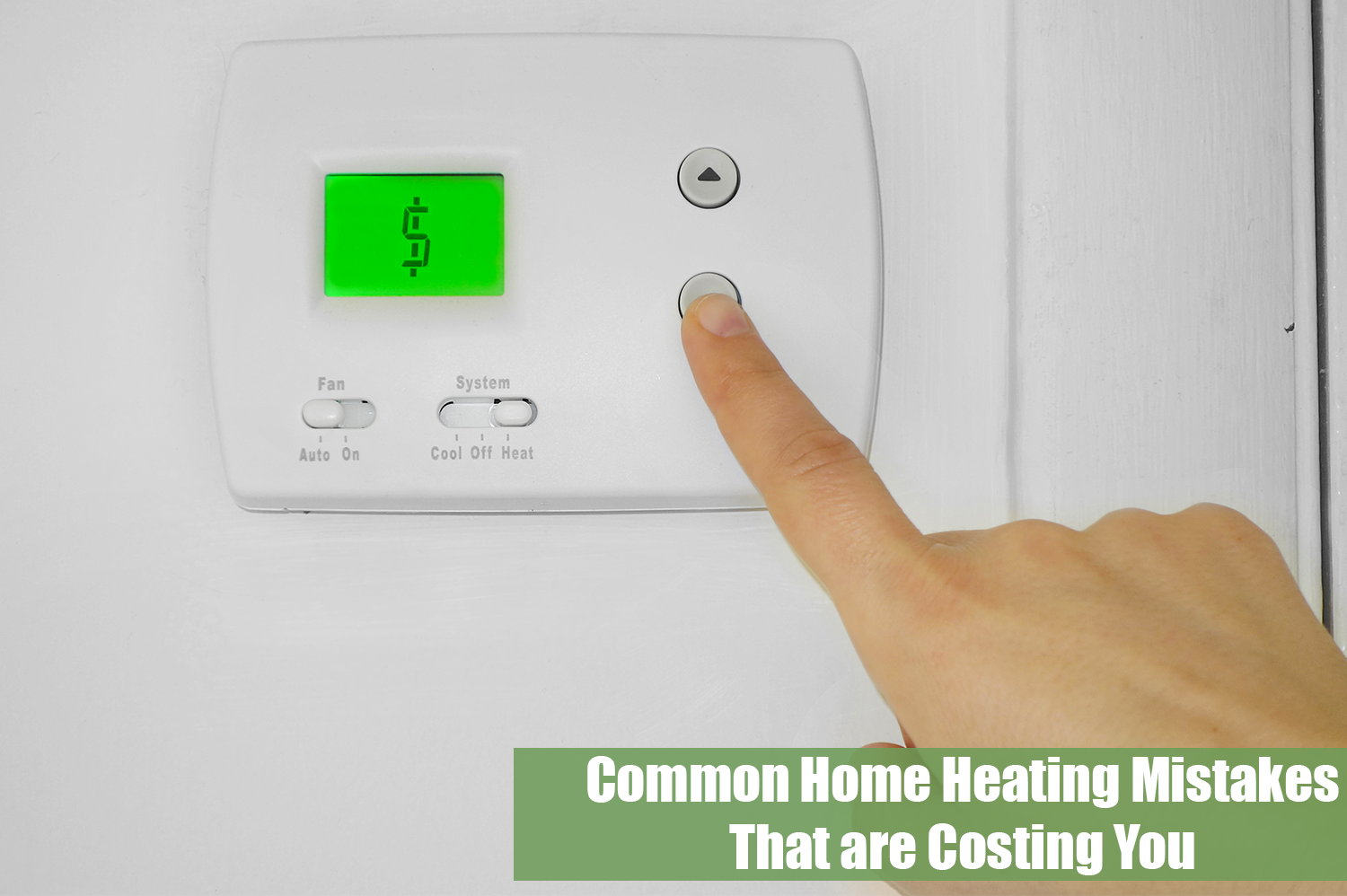 An anonymous person adjusting their home heating with a white wall thermostat with a dollar sign on the screen.