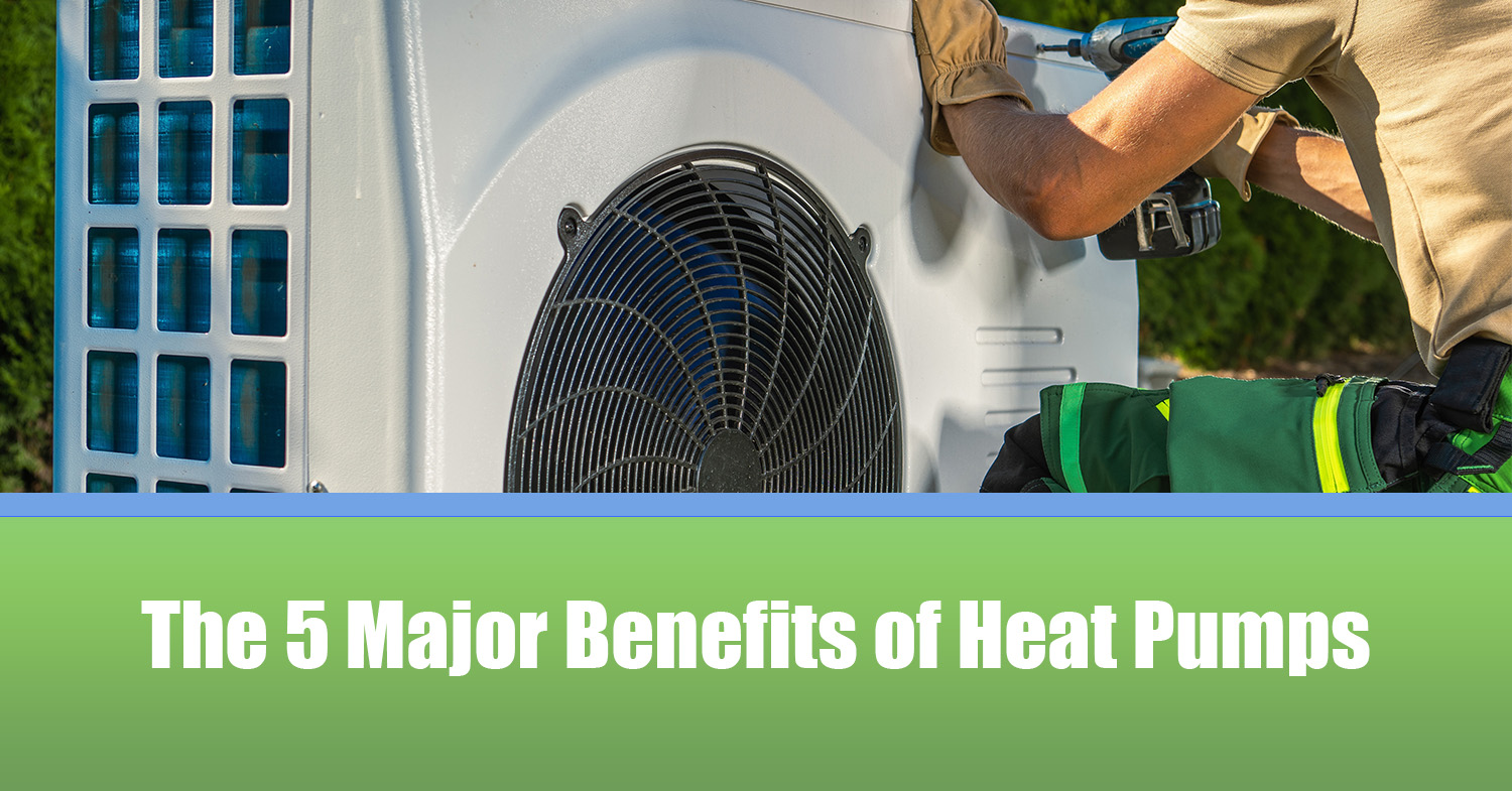 An HVAC technician installing one of many heat pumps.